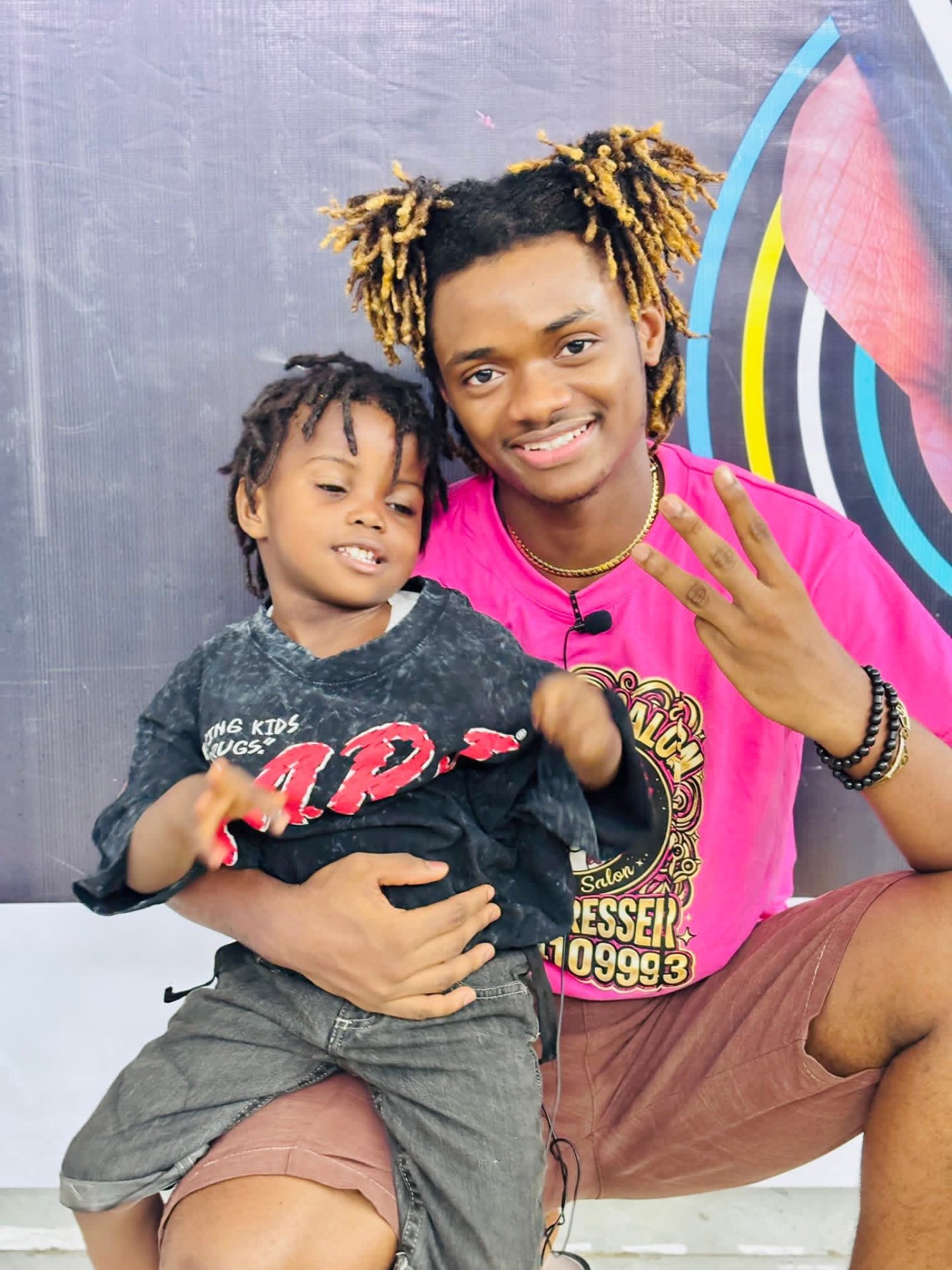 Jacob Sesay with a young fan backstage at House of Stars Season 3